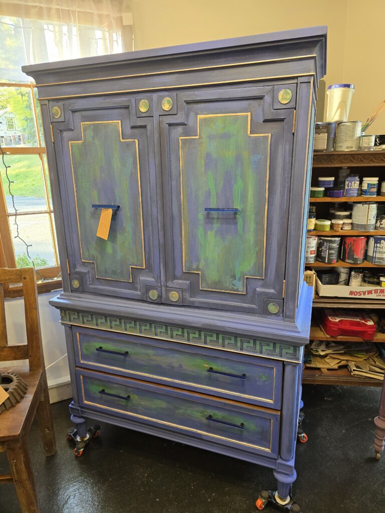 Thomasville Hollywood Armoire reimagined.  Meet “The Santorini!”  Mediterranean vibes all around.  Beautiful condition with new Bulgarian glass hardware and blended art. $1200